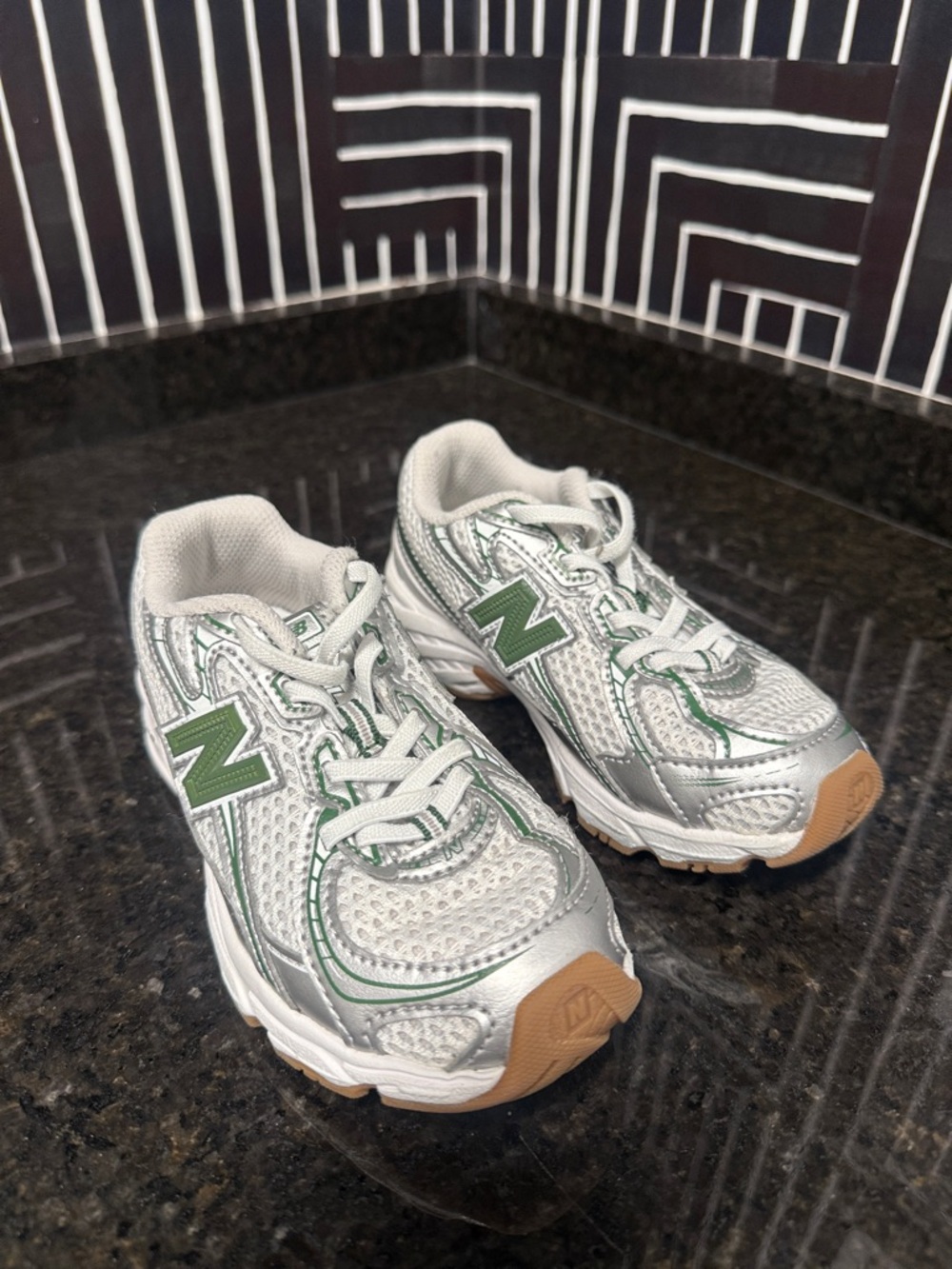 New Balance Silver Sneakers with Green Accents for Kids